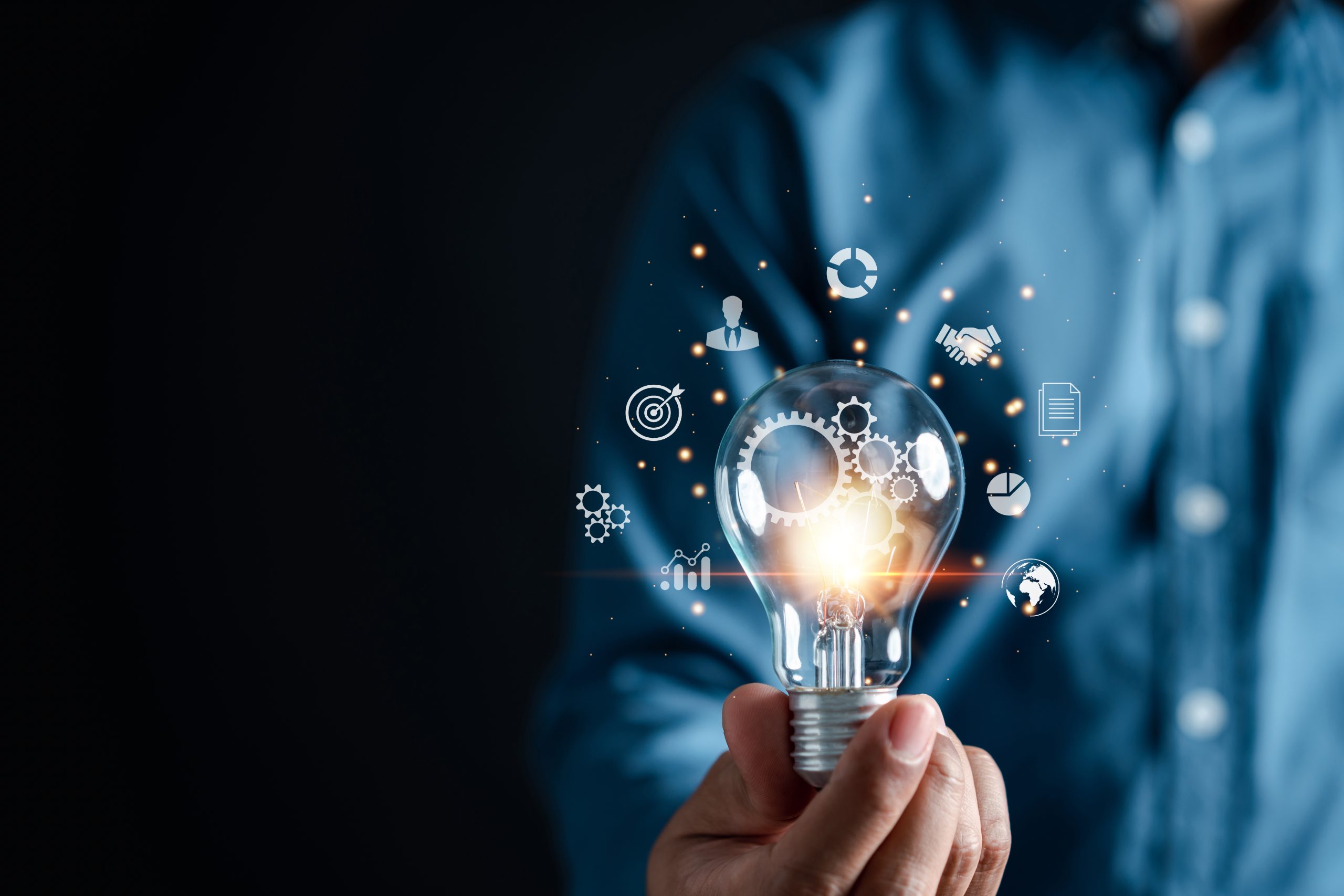 Man hand holding lightbulb which for mind, creative, idea, innovation, motivation planning development leadership and customer target group concept.